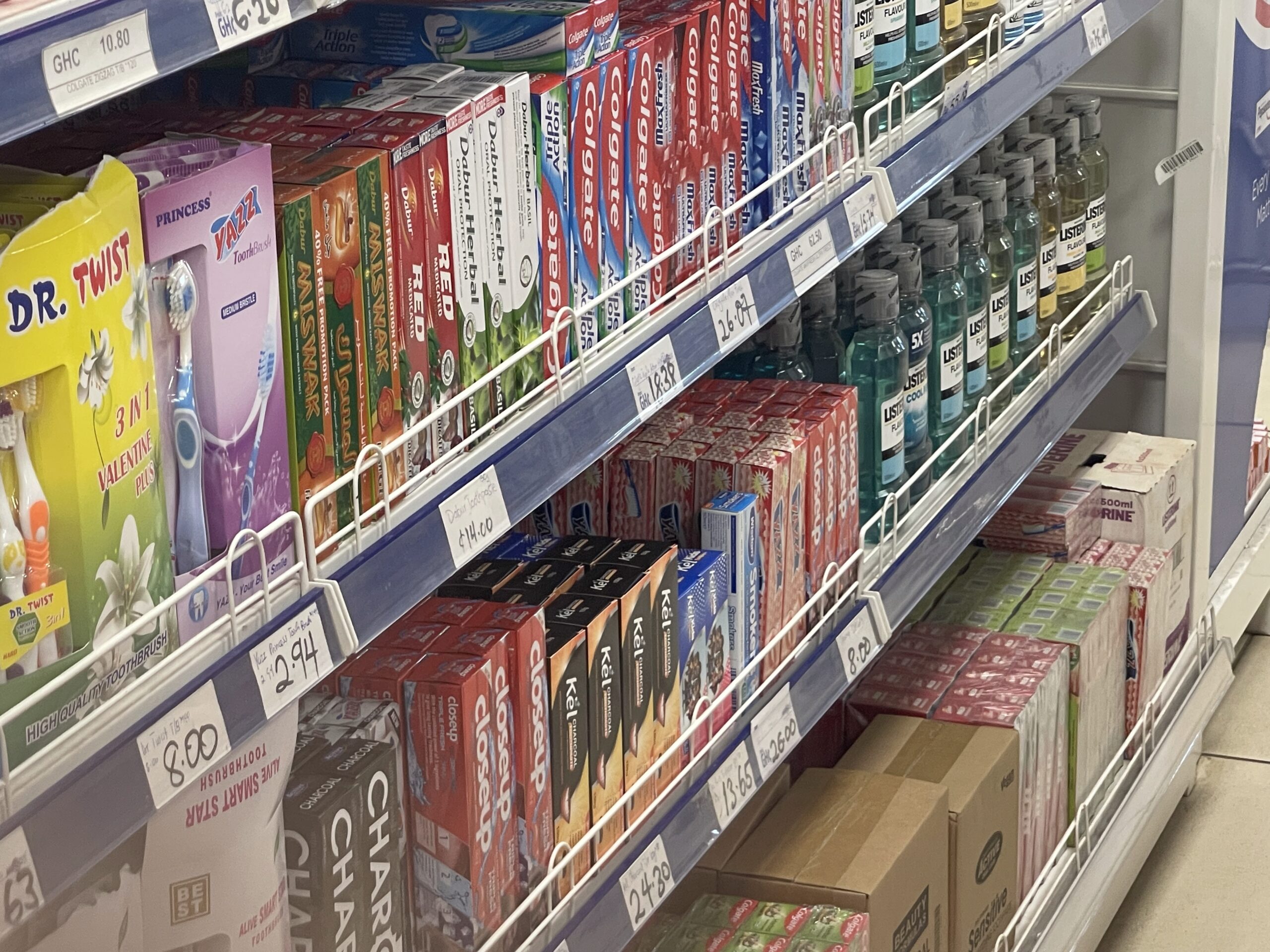 toothpastes on display in a shop